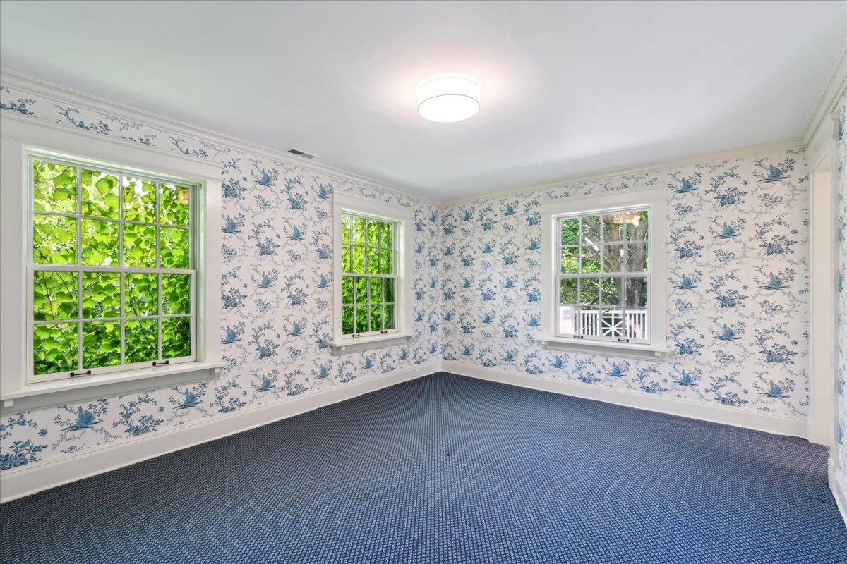 126 Hazel Avenue Glencoe, IL 60022 - Photo 24 of 44 a view of an empty room with a window