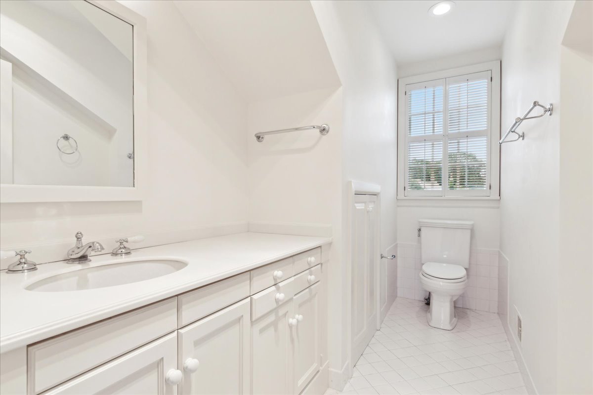 126 Hazel Avenue Glencoe, IL 60022 - Photo 30 of 44 a bathroom with a sink a toilet and shower