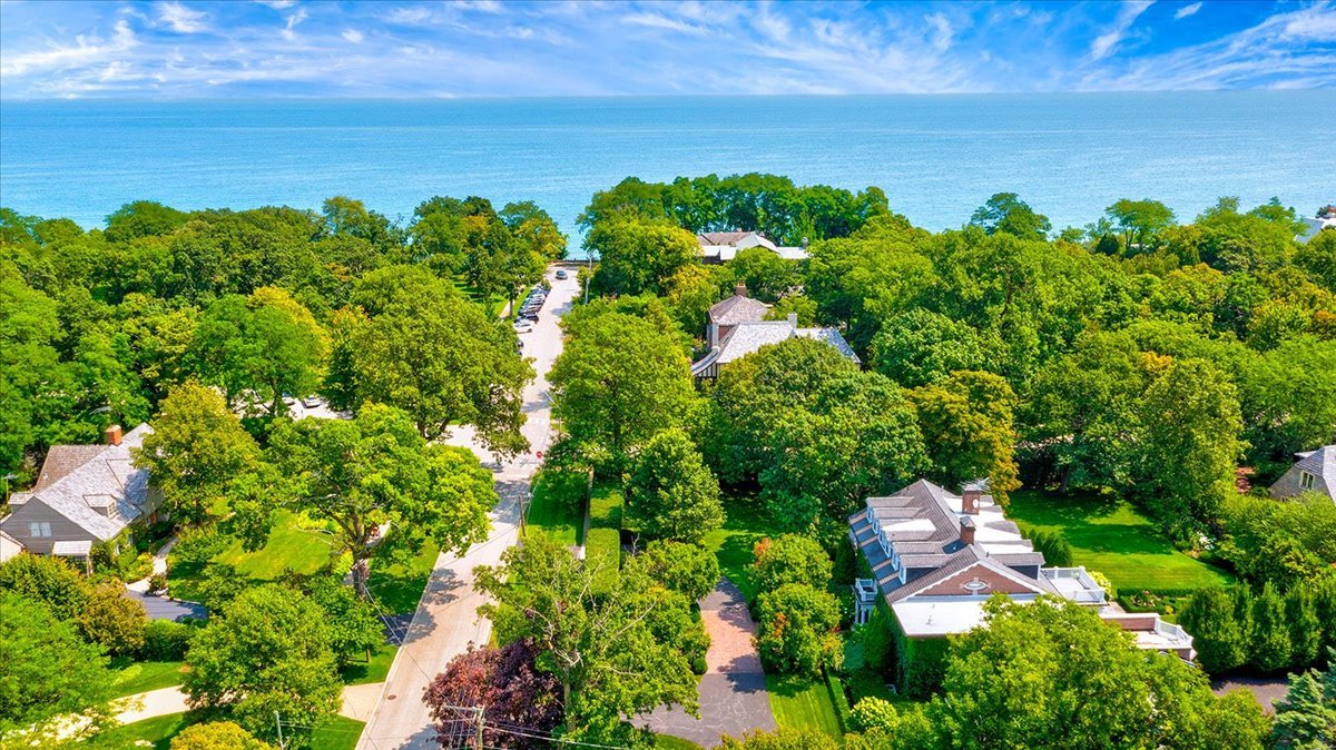 126 Hazel Avenue Glencoe, IL 60022 - Photo 39 of 44 a view of a yard with plants and large trees