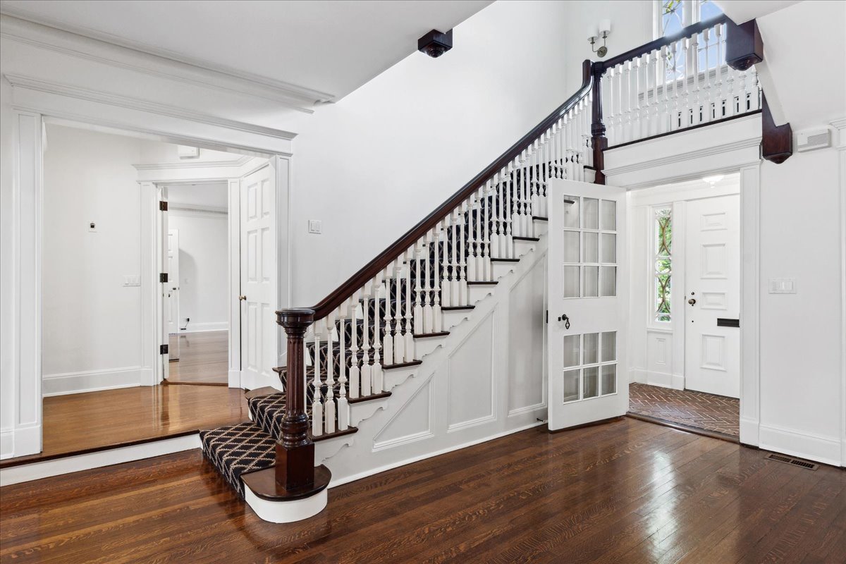 126 Hazel Avenue Glencoe, IL 60022 - Photo 4 of 44 a view of entryway with wooden floor and stairs