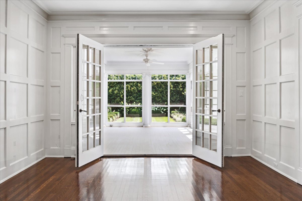 126 Hazel Avenue Glencoe, IL 60022 - Photo 6 of 44 a view of a room with wooden floor and windows