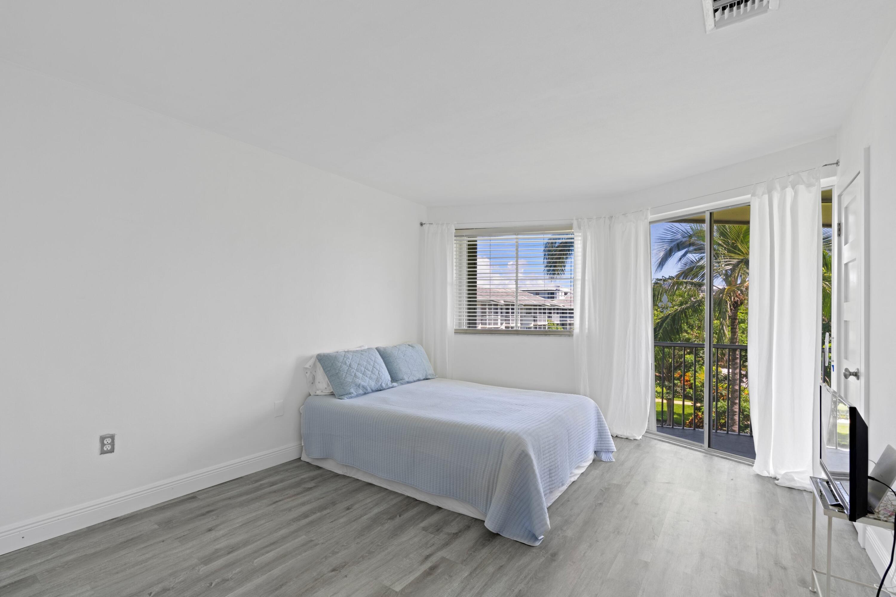 2760 Banyan Road, Unit 32 Boca Raton, FL 33432 - Photo 9 of 27 Master Bedroom