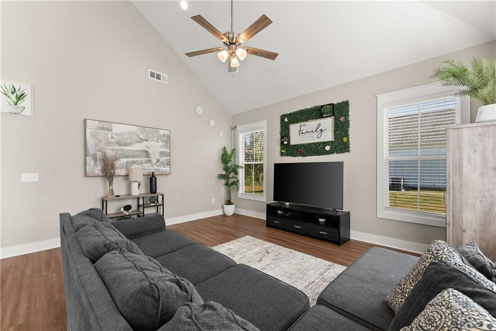 230 Campbell Street Cleveland, GA 30528 - Photo 14 of 37 a living room with furniture and a flat screen tv