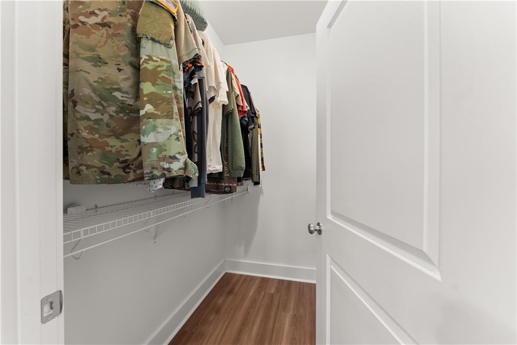 230 Campbell Street Cleveland, GA 30528 - Photo 22 of 37 a view of walk in closet with clothes