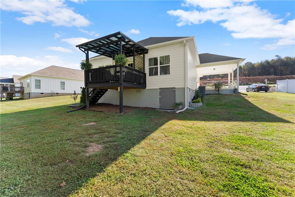 230 Campbell Street Cleveland, GA 30528 - Photo 29 of 37 a view of a house with a yard