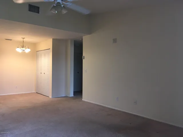 an empty room with a bathroom