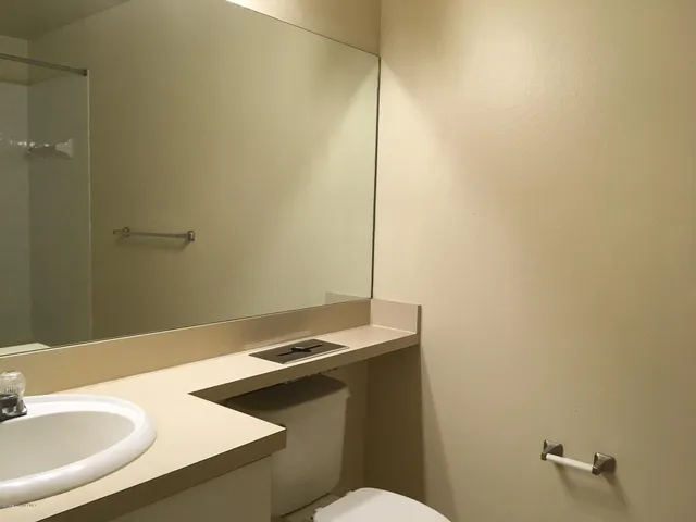 a bathroom with a sink and a toilet