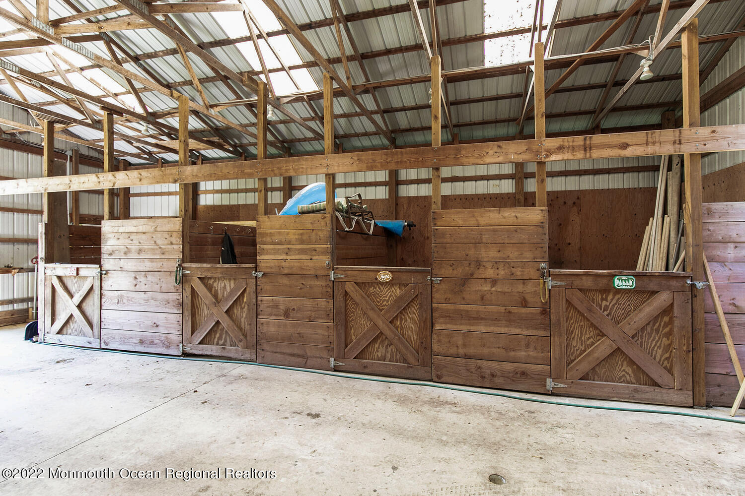104 Peskin Road Farmingdale, NJ 07727 - Photo 12 of 54 a view of a garage with wooden wall