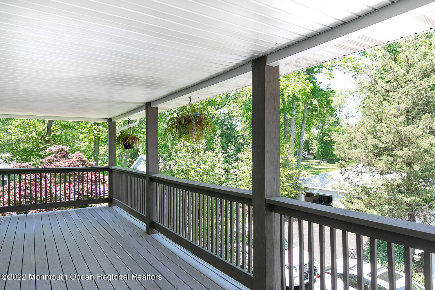 104 Peskin Road Farmingdale, NJ 07727 - Photo 27 of 54 a view of a wooden deck with a yard