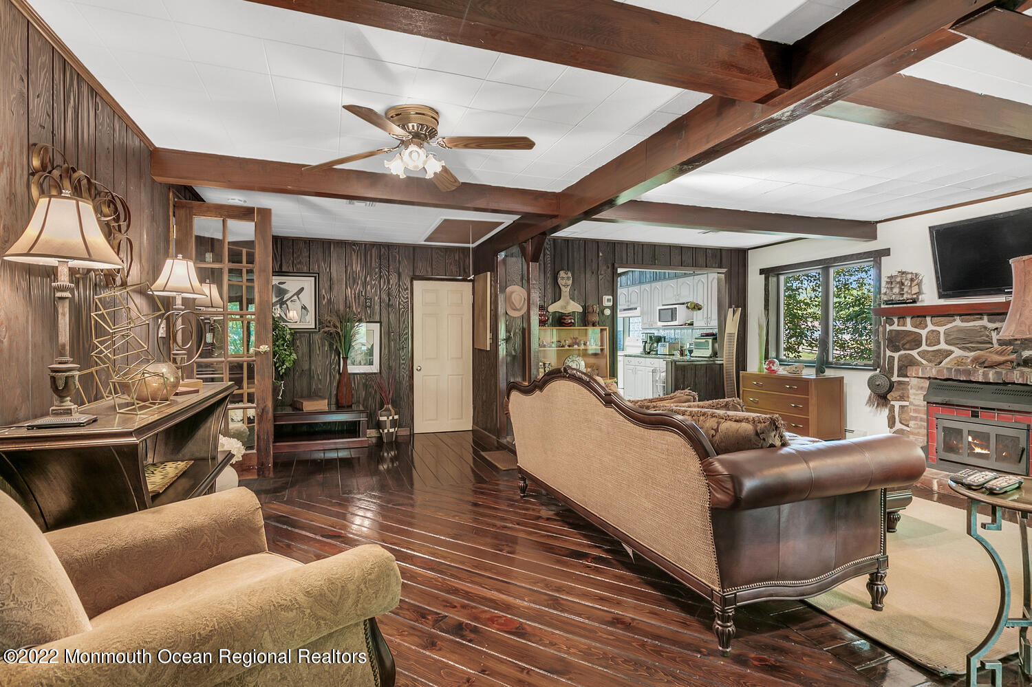 104 Peskin Road Farmingdale, NJ 07727 - Photo 33 of 54 a living room with furniture and a chandelier