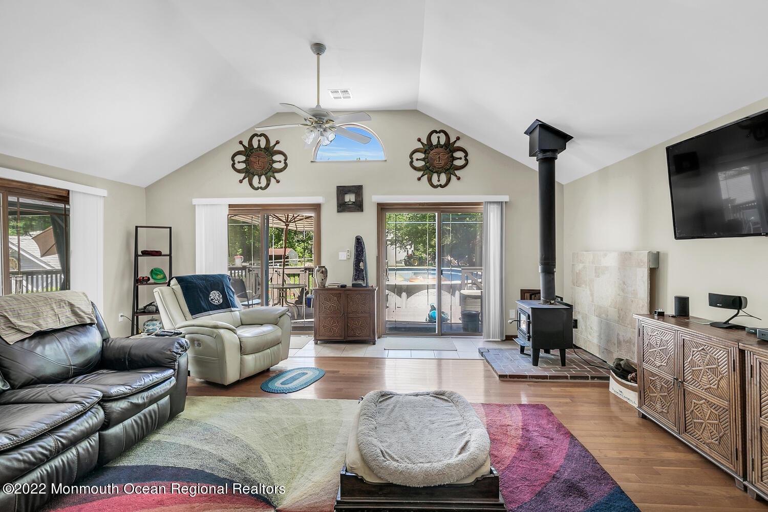 104 Peskin Road Farmingdale, NJ 07727 - Photo 40 of 54 a living room with furniture and a flat screen tv