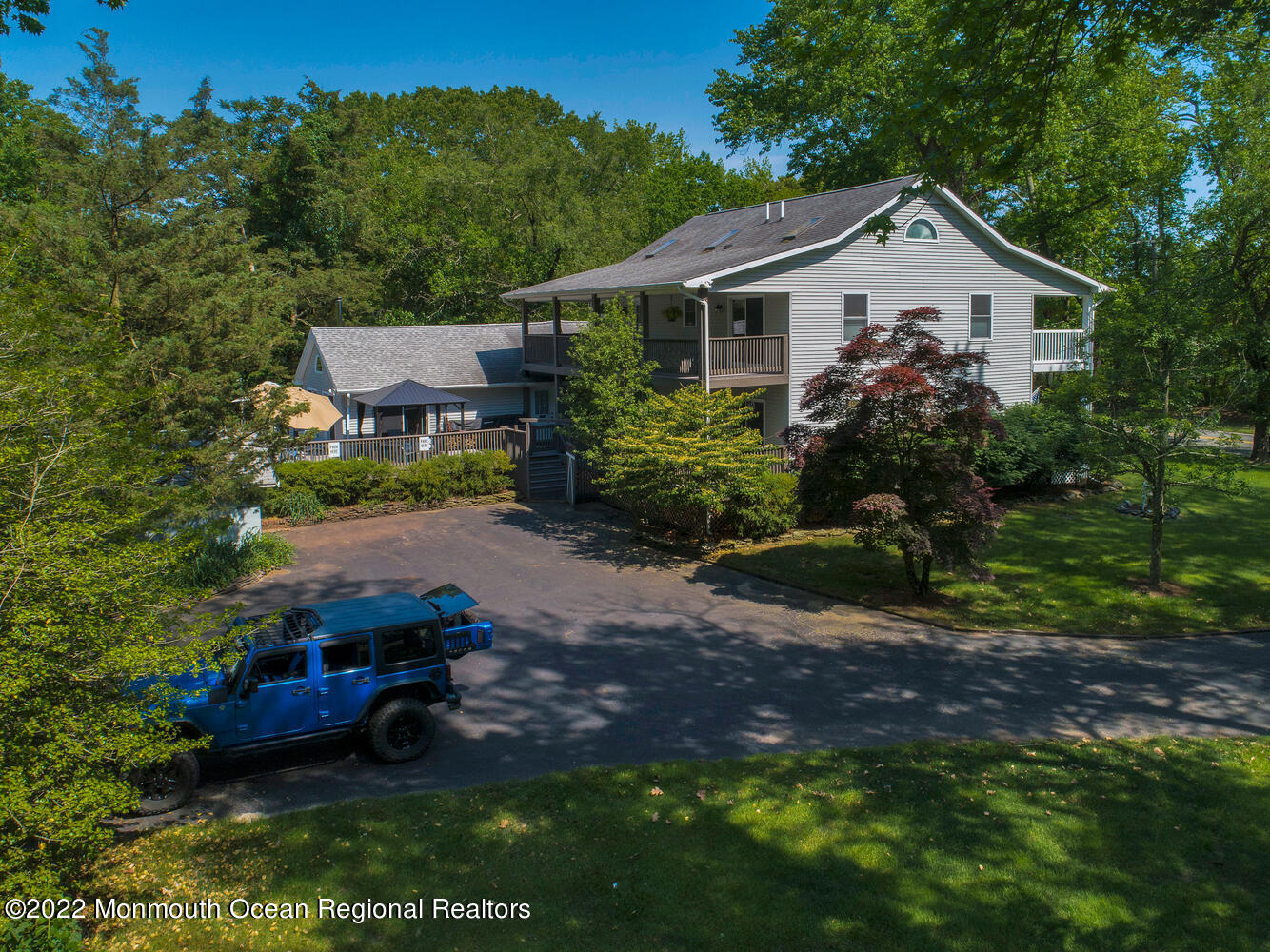 104 Peskin Road Farmingdale, NJ 07727 - Photo 4 of 54 a front view of a house with garden