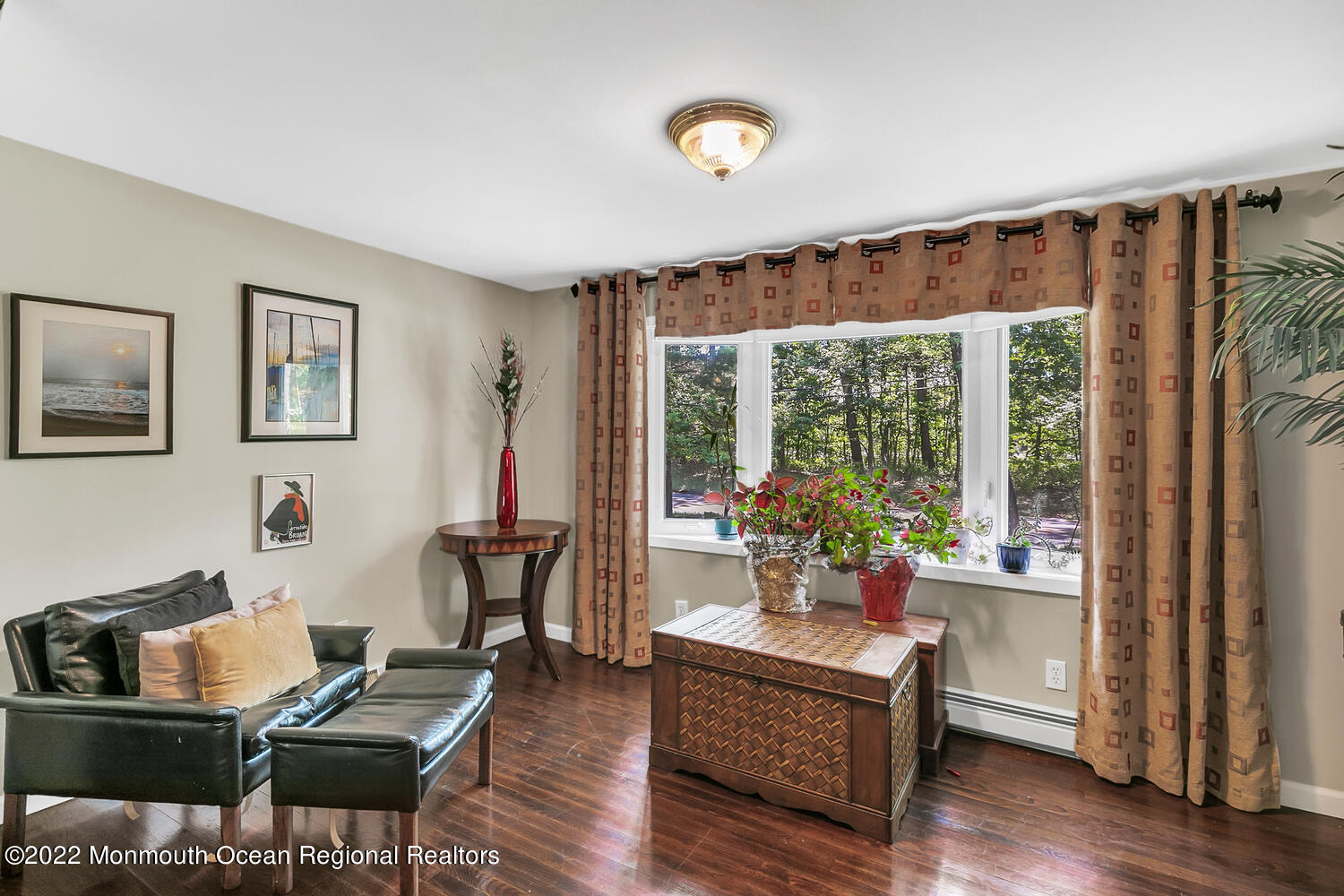 104 Peskin Road Farmingdale, NJ 07727 - Photo 43 of 54 a living room with furniture and a large window