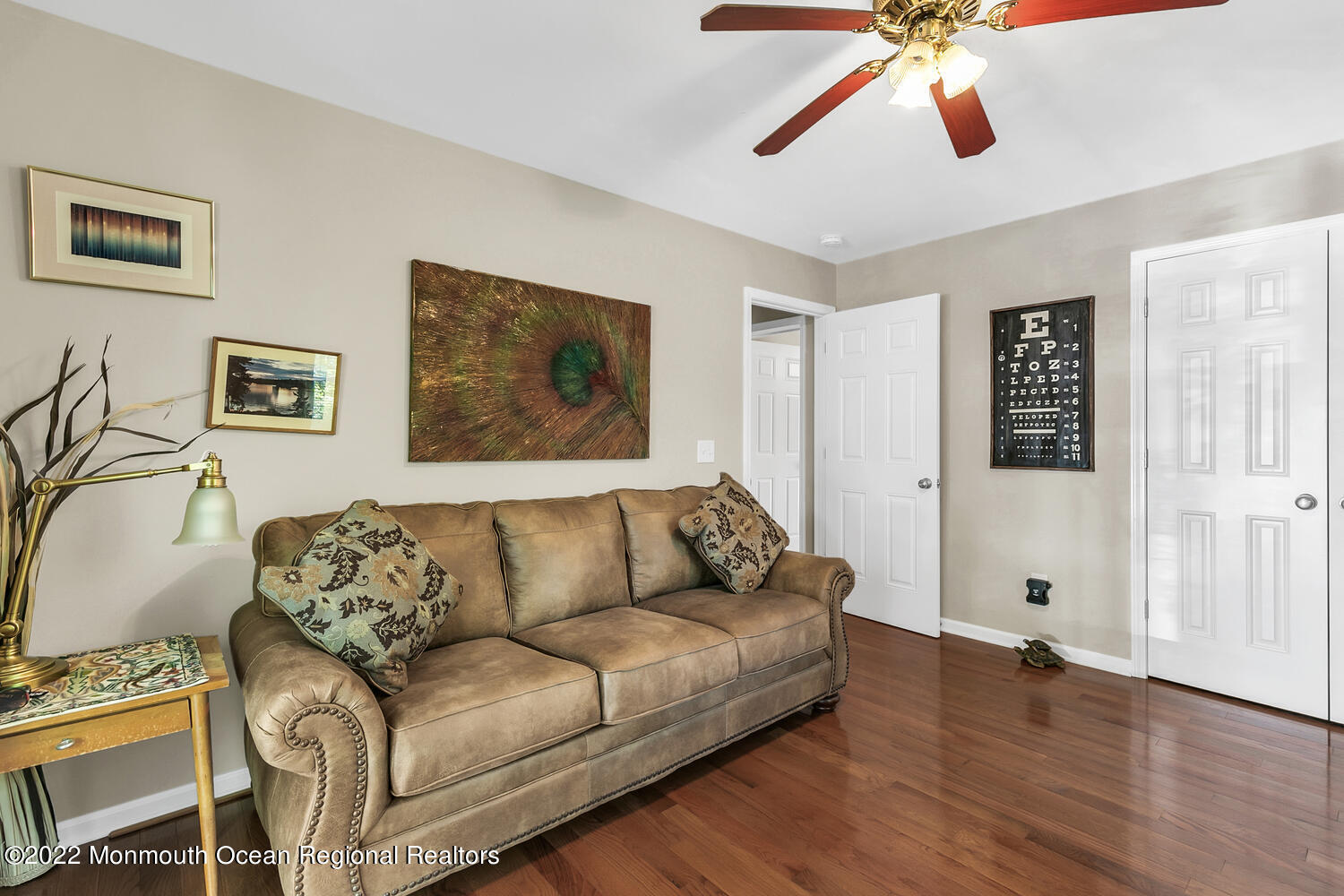 104 Peskin Road Farmingdale, NJ 07727 - Photo 45 of 54 a living room with furniture and wooden floor