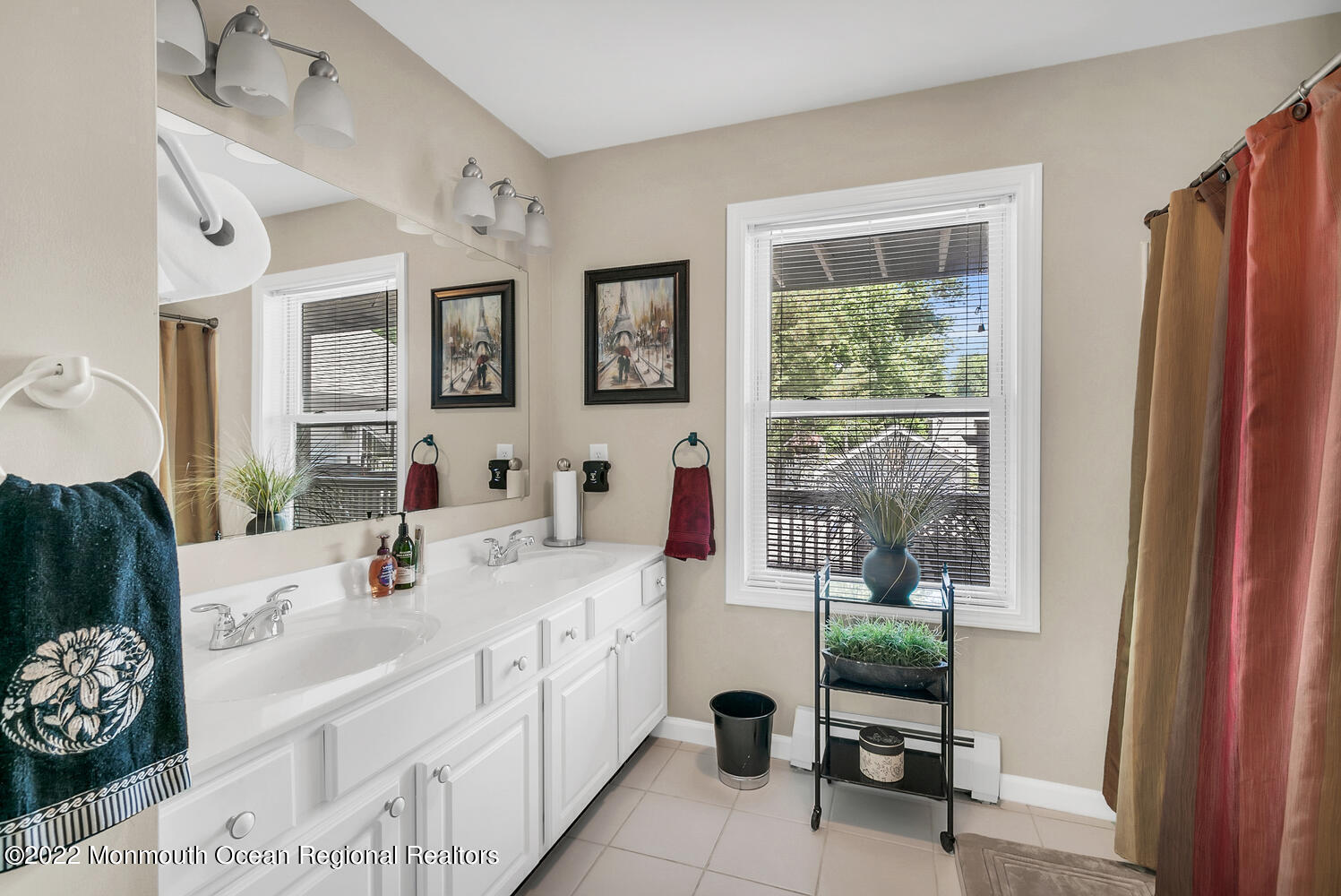 104 Peskin Road Farmingdale, NJ 07727 - Photo 47 of 54 a en suite bathroom with sink and mirror