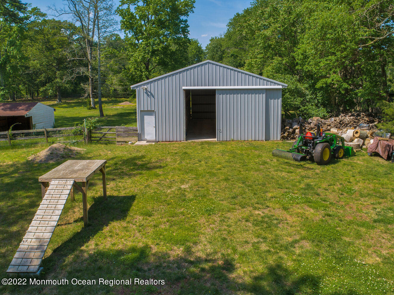 104 Peskin Road Farmingdale, NJ 07727 - Photo 6 of 54 a view of a house with backyard and garden