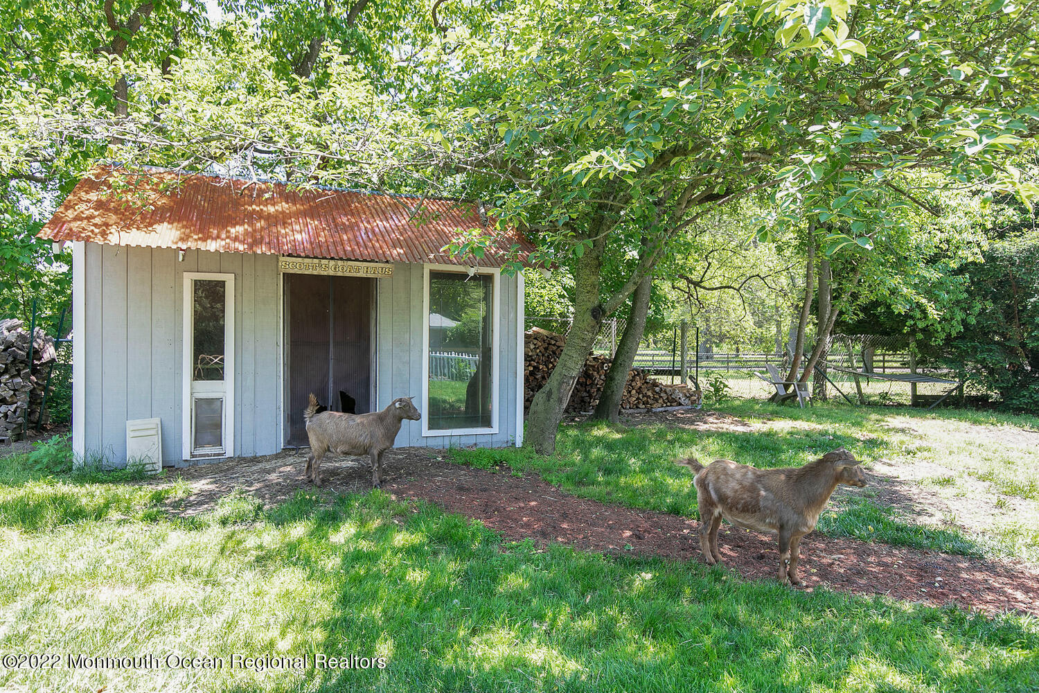 104 Peskin Road Farmingdale, NJ 07727 - Photo 10 of 54 a house view with a sitting space and garden