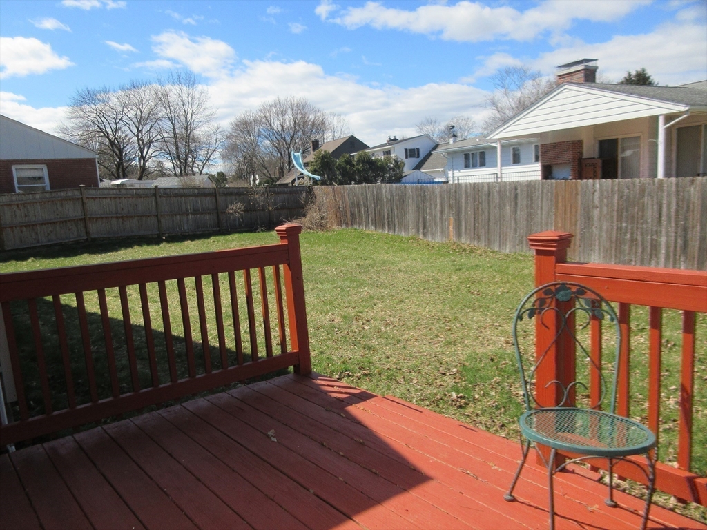 13 Sutton Place Easthampton, MA 01027 - Photo 22 of 31 a view of a wooden deck with furniture