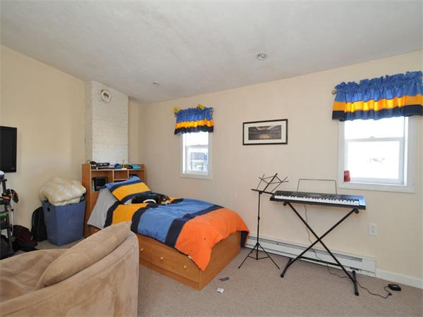 2 Ward Court Boston, MA 02127 - Photo 13 of 15 a bedroom with a bed and window