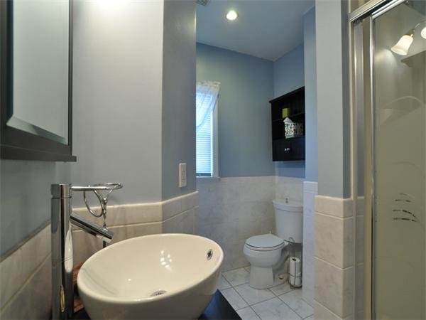 2 Ward Court Boston, MA 02127 - Photo 9 of 15 a bathroom with a toilet a sink and mirror