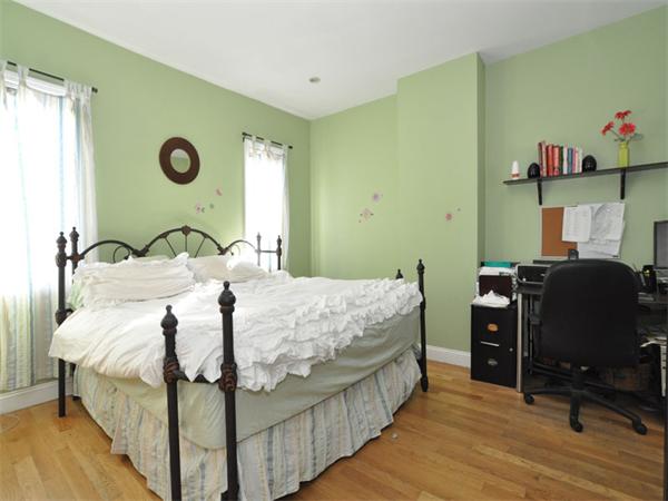 2 Ward Court Boston, MA 02127 - Photo 10 of 15 a bedroom with a bed and wooden floor