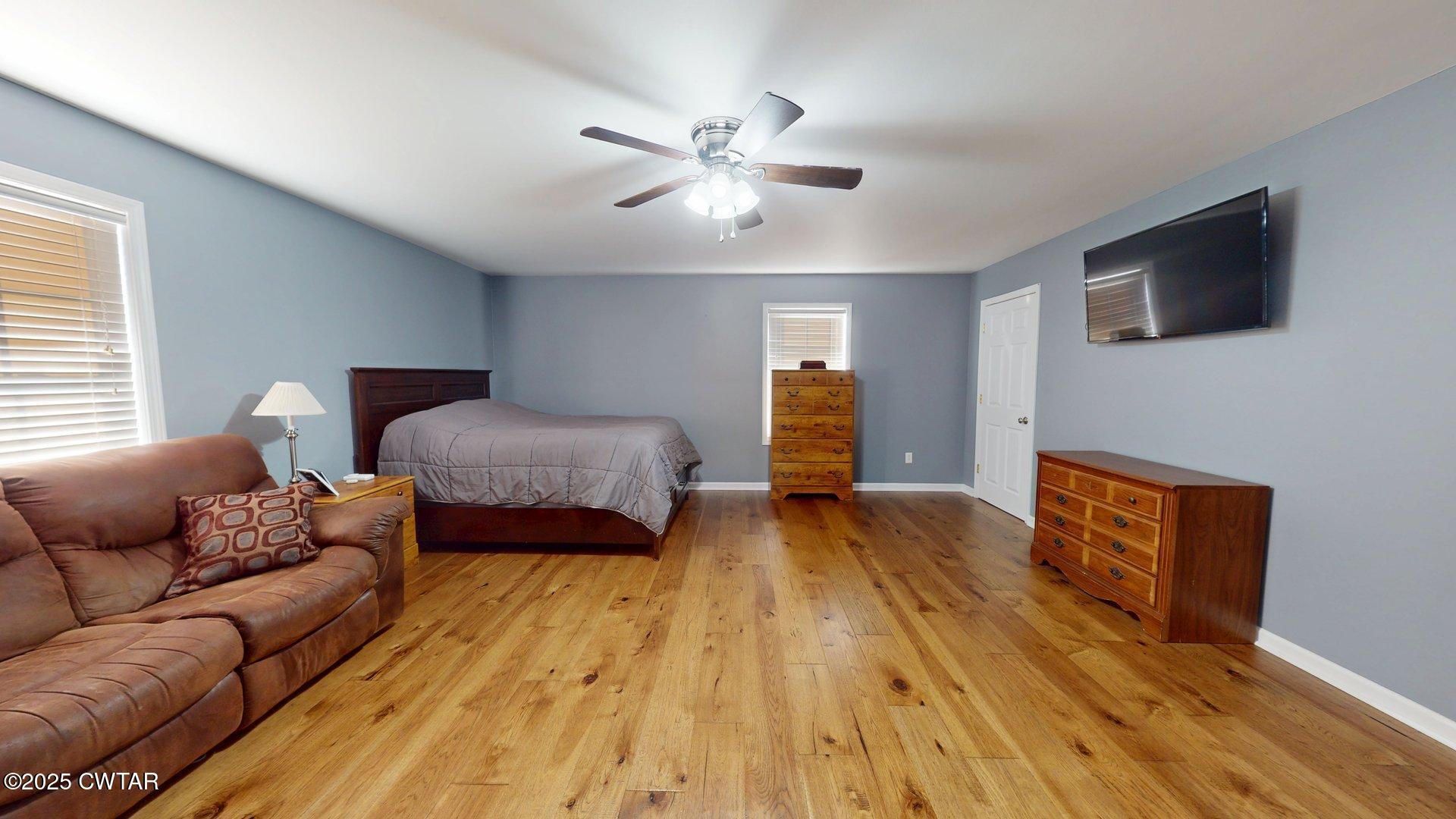 968 Cherokee Road Halls, TN 38040 - Photo 16 of 20 a spacious bedroom with a bed and a couch