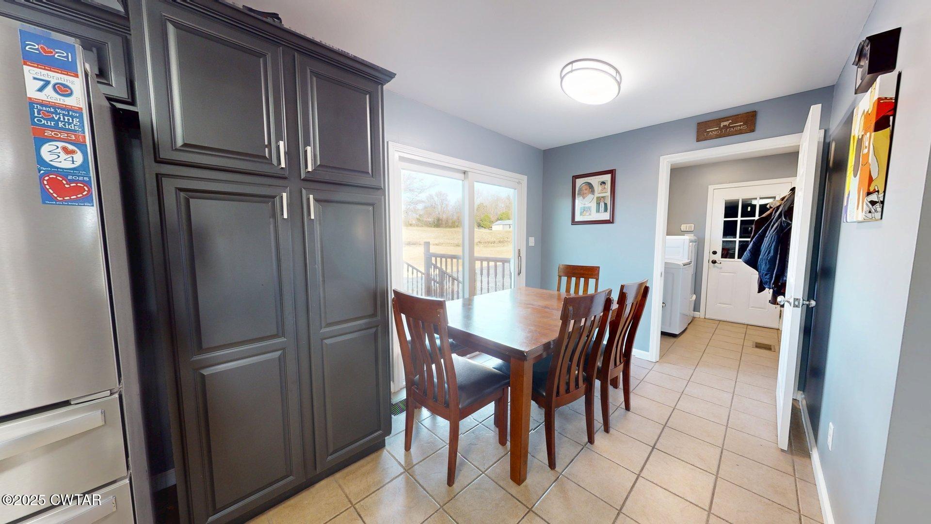968 Cherokee Road Halls, TN 38040 - Photo 6 of 20 a view of a dining room with furniture window and refrigerator