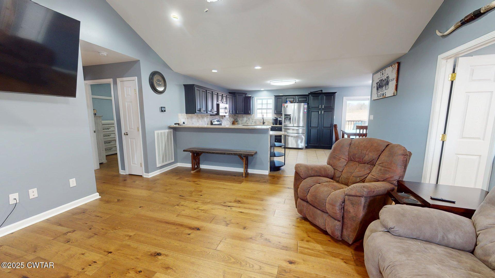 968 Cherokee Road Halls, TN 38040 - Photo 7 of 20 a living room with furniture and a fireplace