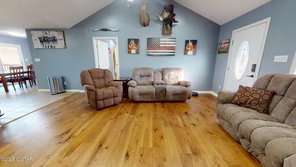 a living room with furniture and a couch