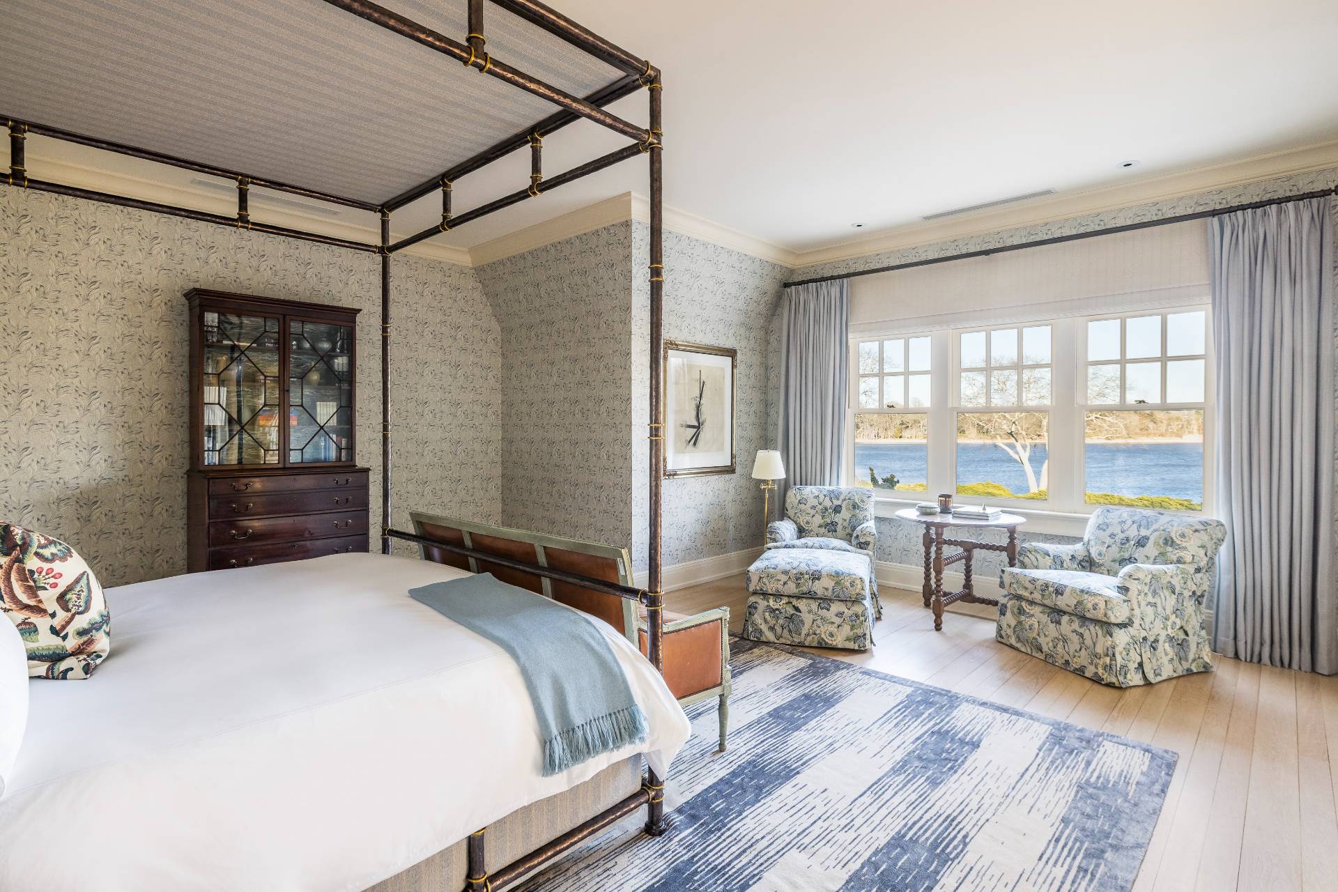 38 Mathews Road Wainscott, NY 11975 - Photo 33 of 48 a bedroom with a bed and wooden floor