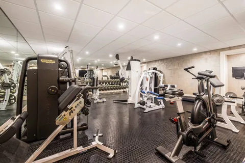 a view of a room with gym equipment