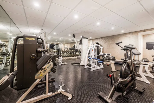a view of a room with gym equipment