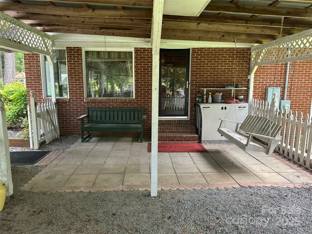 a view of porch with seating space