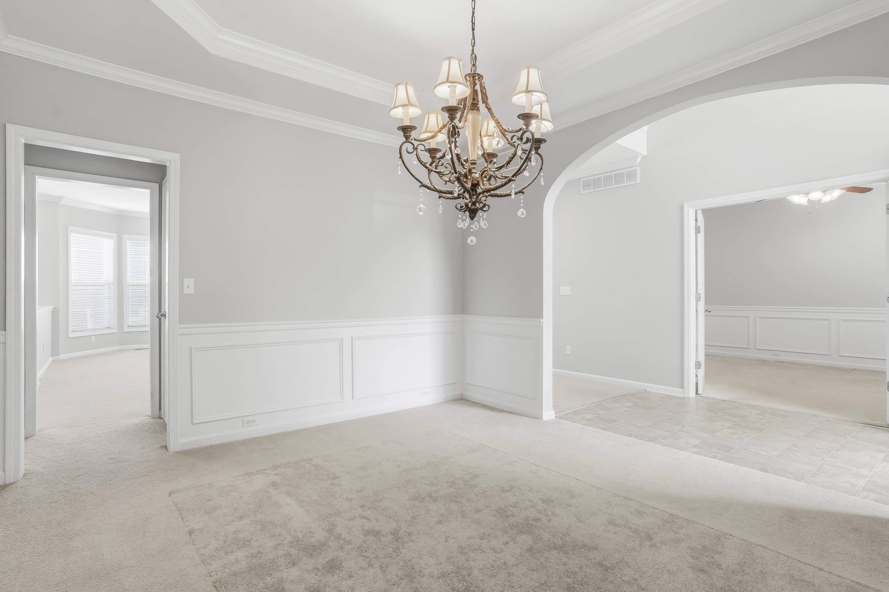 4357 Rivard Lane Lexington, KY 40509 - Photo 19 of 86 Arched doorway leads to entry & regular doorway leads to basement stairs & family room.