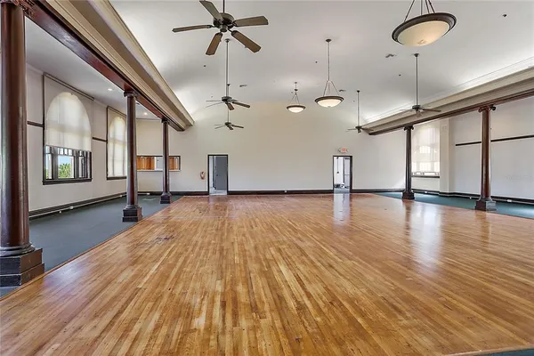 a view of an entryway with wooden floors