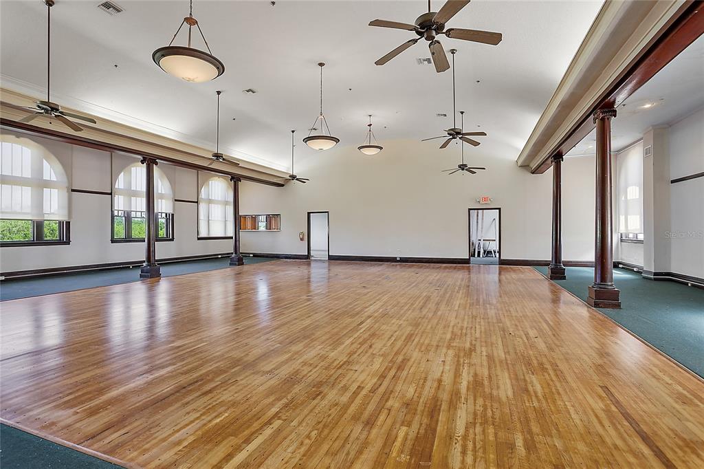 410 West Main Street Leesburg, FL 34748 - Photo 12 of 28 a view of a room with lots of wooden floor