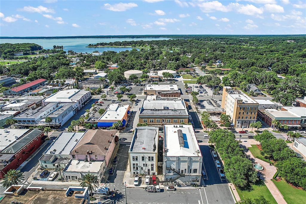 410 West Main Street Leesburg, FL 34748 - Photo 20 of 28 an aerial view of residential houses with outdoor space and street view