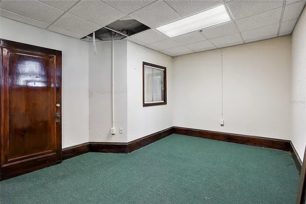 an empty room with windows