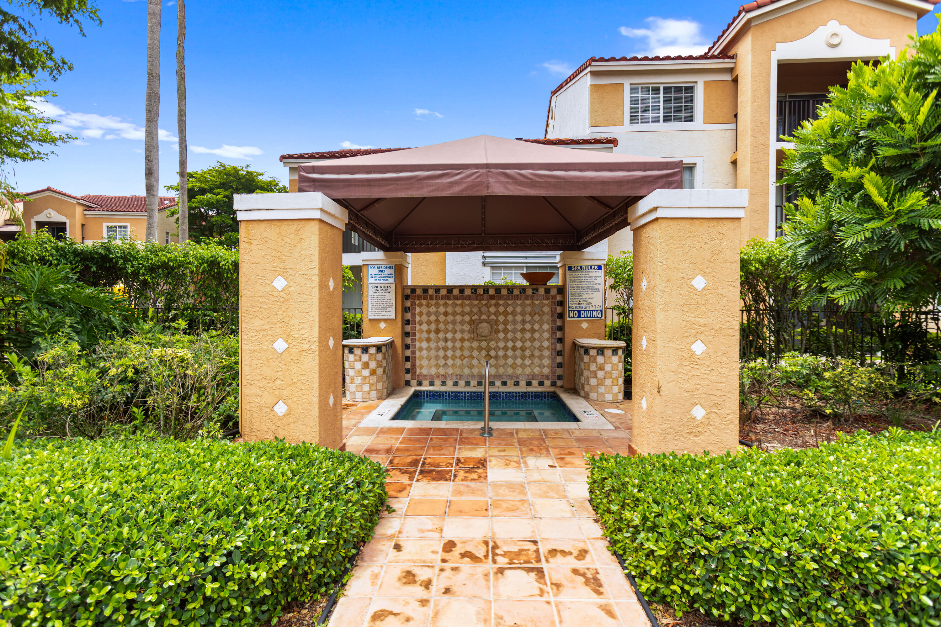 2113 Renaissance Boulevard, Unit 306 Miramar, FL 33025 - Photo 57 of 59 a view of outdoor space yard and front view of a house