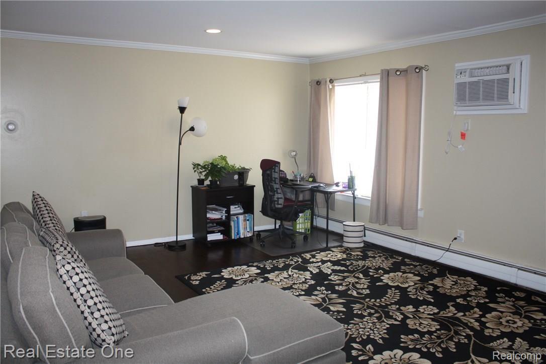 761 West Maple Road, Unit 54 Clawson, MI 48017 - Photo 5 of 17 Living Room.jpg