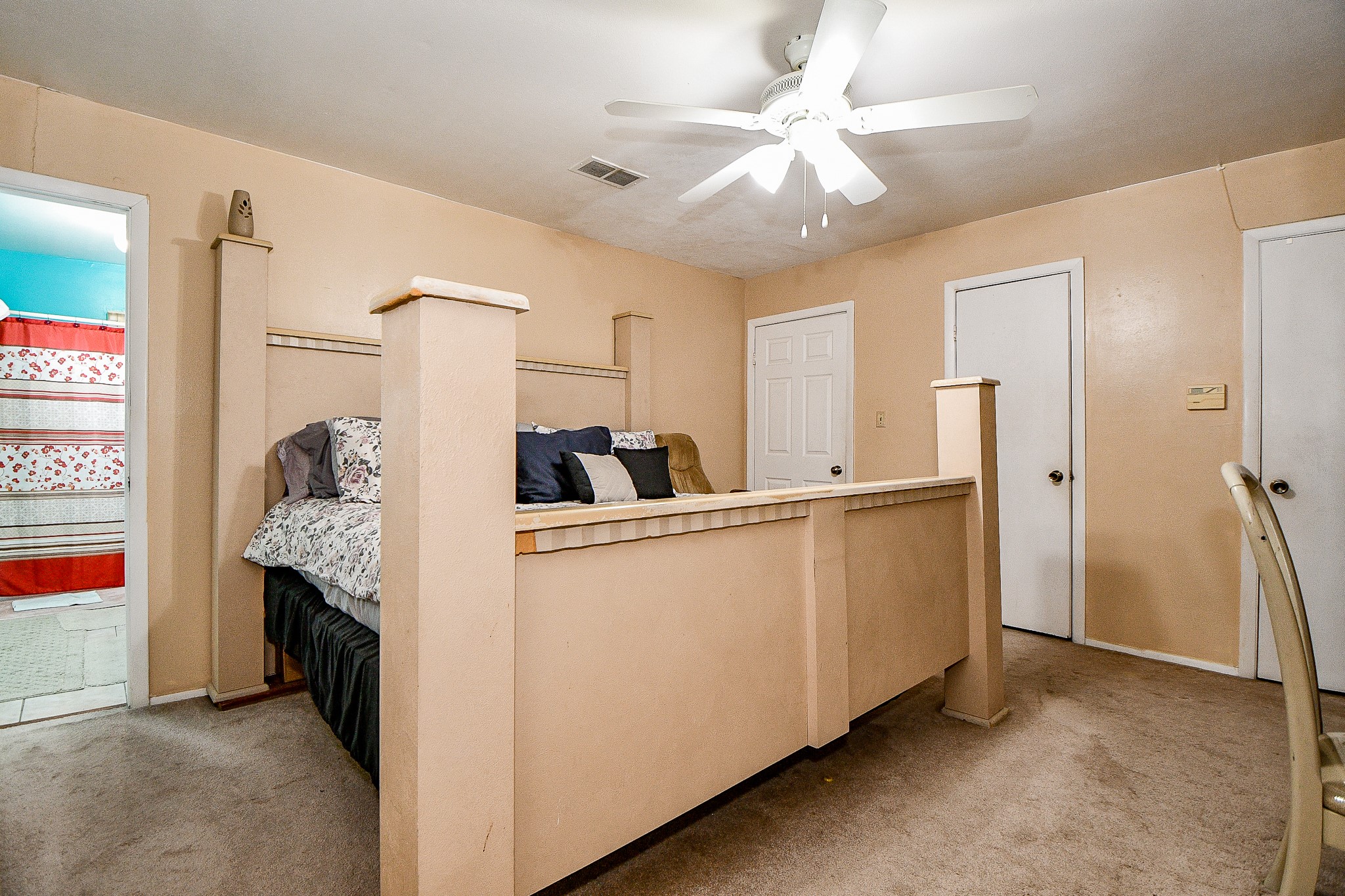 2923 West Greens Road Houston, TX 77067 - Photo 26 of 32 a view of living room with furniture and a ceiling fan