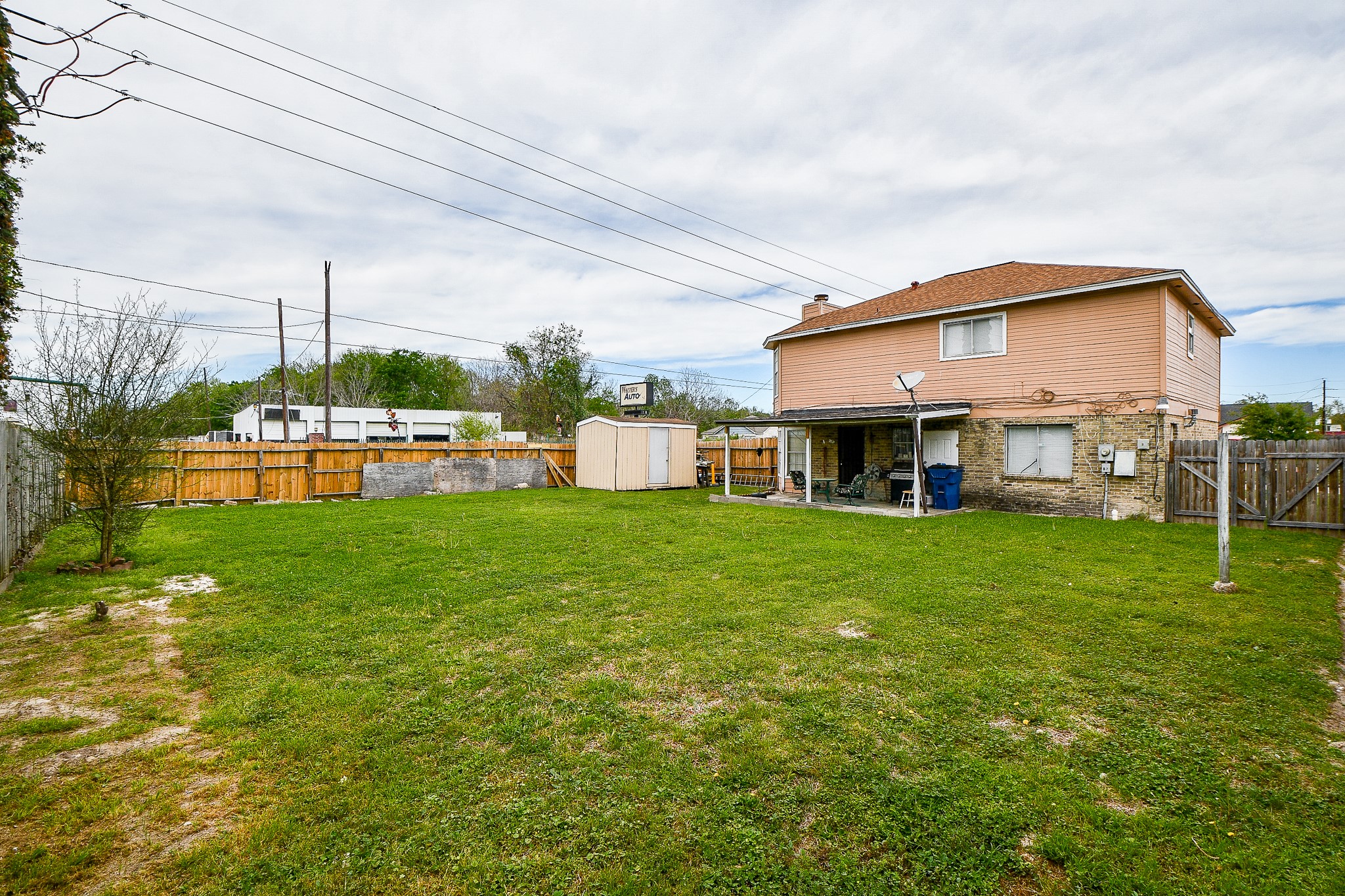 2923 West Greens Road Houston, TX 77067 - Photo 31 of 32 a view of a house with a yard porch and sitting area