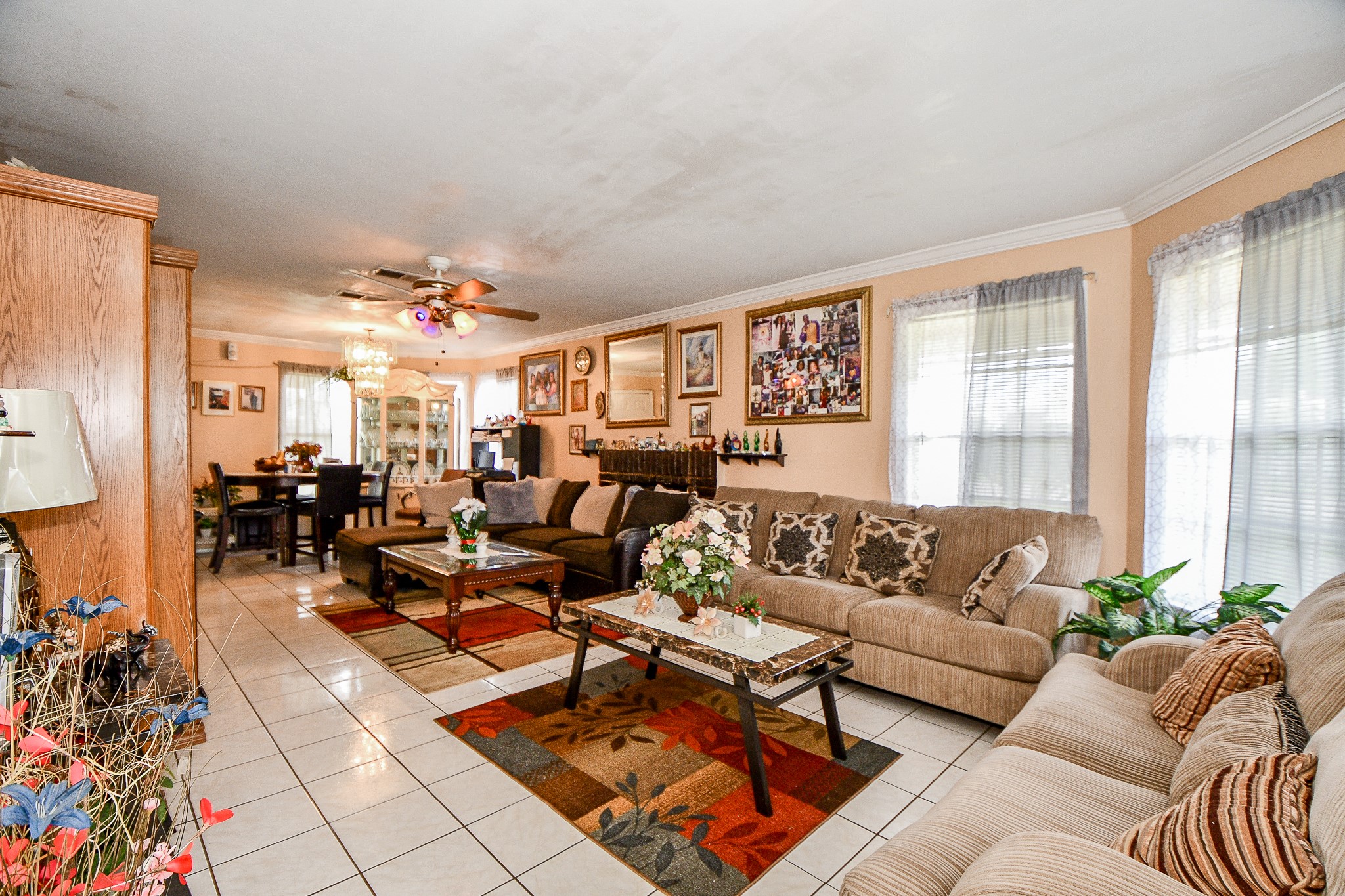2923 West Greens Road Houston, TX 77067 - Photo 5 of 32 a living room with furniture and a large window
