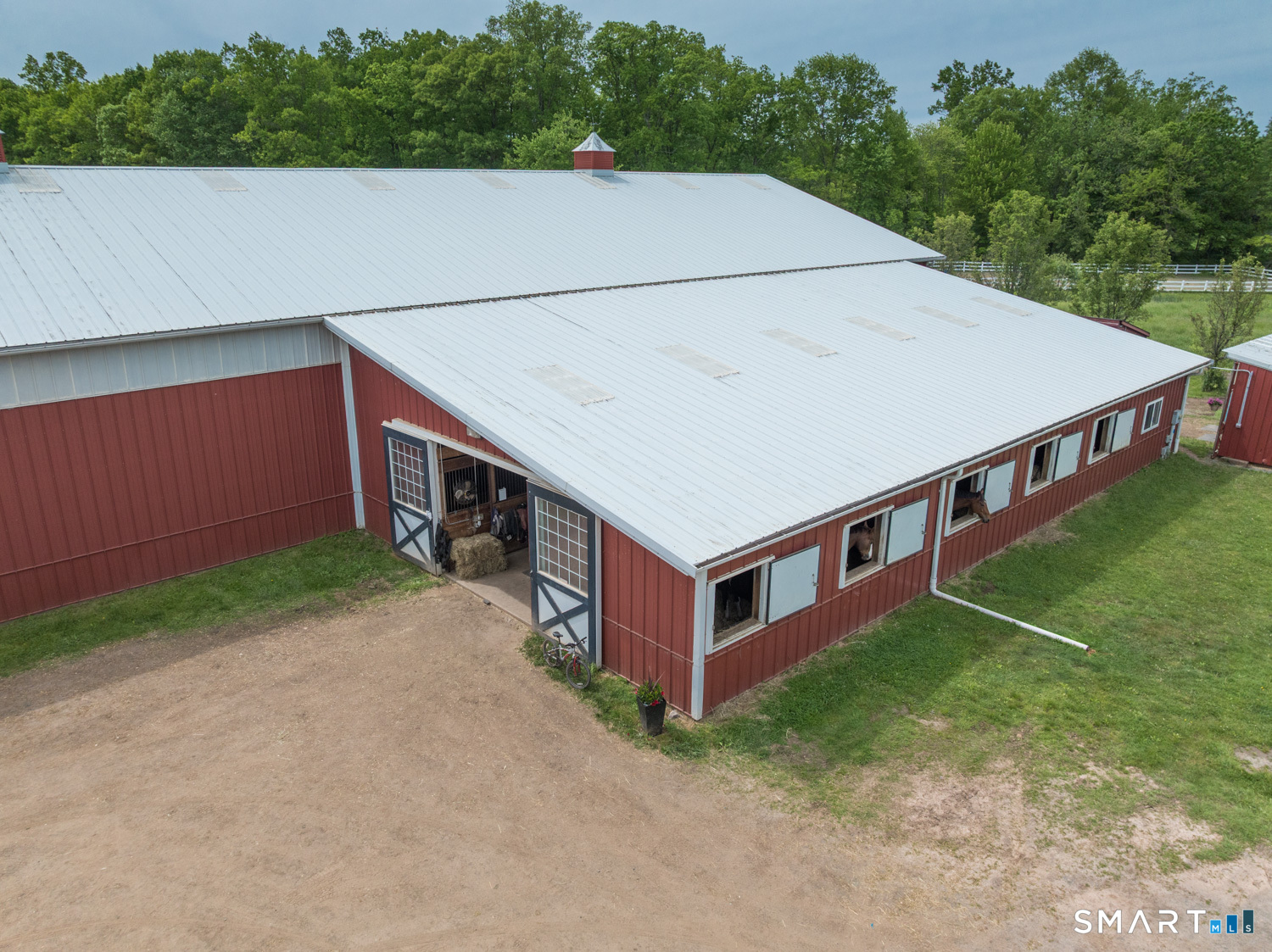 949 North Street Suffield, CT 06078 - Photo 22 of 33 a aerial view of a house with a yard and a garage