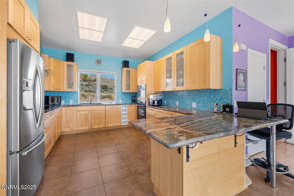 3662 Cindy's Trail Carson City, NV 89705 - Photo 11 of 44 a kitchen with a sink cabinets and window
