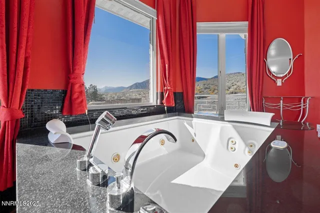 a view of living room with furniture and a window