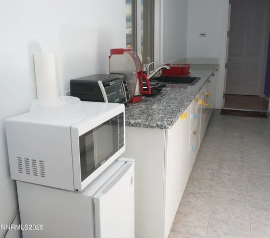 a utility room with washer and dryer