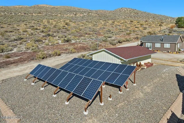 a view of a roof deck with mountain view and mountain view