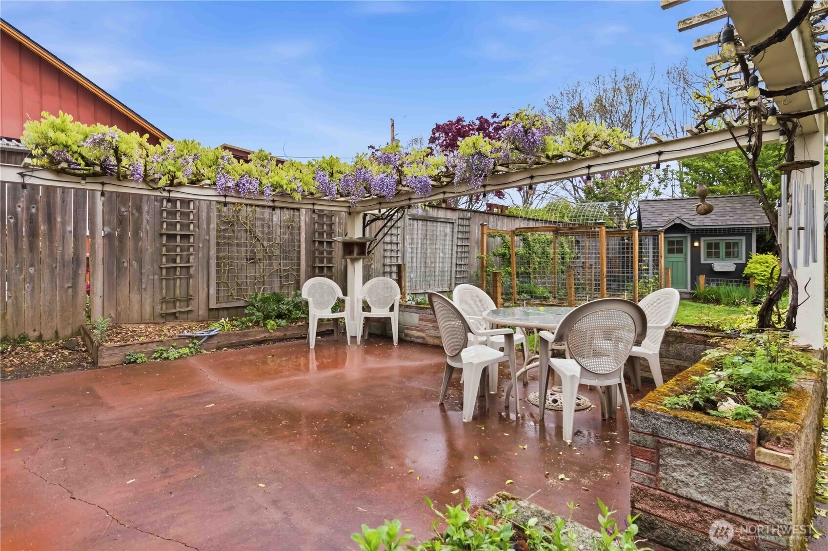 1306 23rd Avenue Longview, WA 98632 - Photo 29 of 40 a table and chairs in front of a building