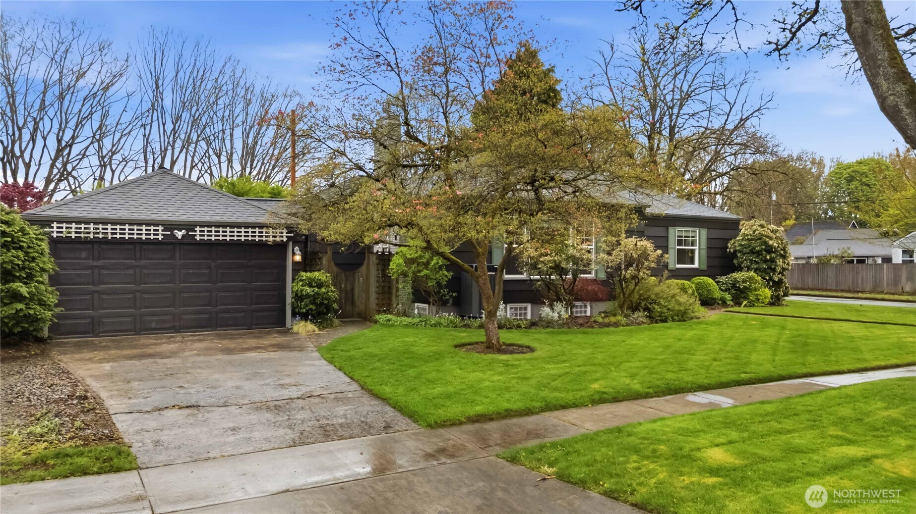 1306 23rd Avenue Longview, WA 98632 - Photo 3 of 40 a front view of a house with a yard